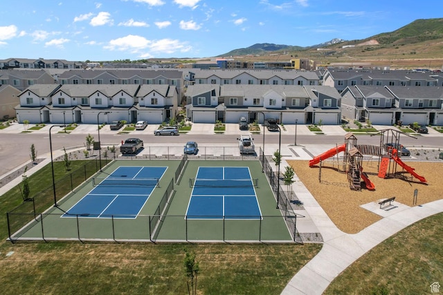 drone / aerial view with a mountain view and a residential view
