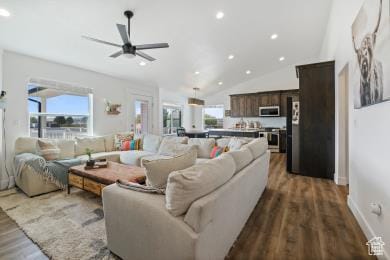 1065 W 275 S, Tremonton, UT 84337 - living room with vaulted ceiling, a ceiling fan, wood finished floors, baseboards, and recessed lighting