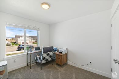 1065 W 275 S, Tremonton, UT 84337 - carpeted home office featuring baseboards