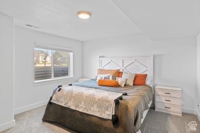1065 W 275 S, Tremonton, UT 84337 - bedroom featuring carpet flooring and baseboards