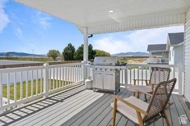 1065 W 275 S, Tremonton, UT 84337 - wooden terrace featuring a mountain view