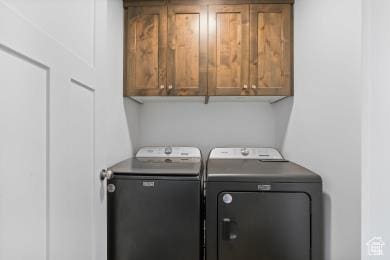 1065 W 275 S, Tremonton, UT 84337 - washroom with washing machine and dryer and cabinet space