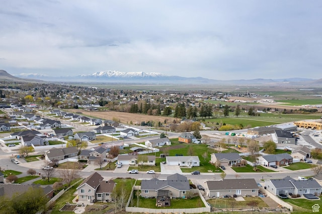 aerial view featuring a residential view and a mountain view