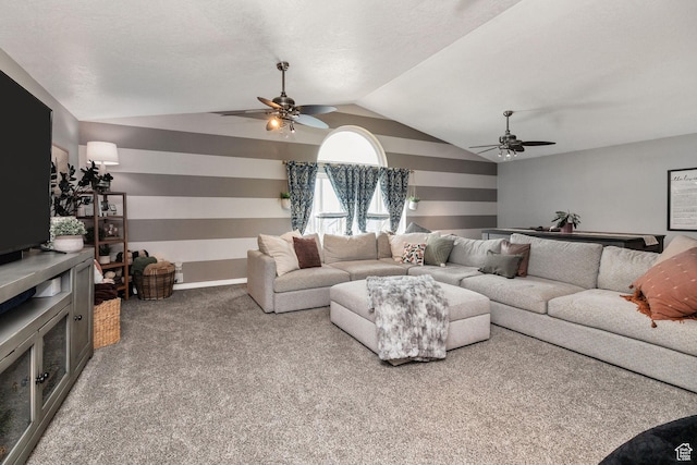 living room featuring lofted ceiling, carpet flooring, and ceiling fan