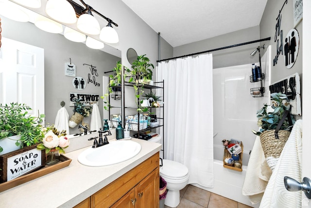 bathroom featuring shower / tub combo, tile patterned floors, vanity, and toilet