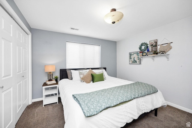 carpeted bedroom with baseboards and visible vents