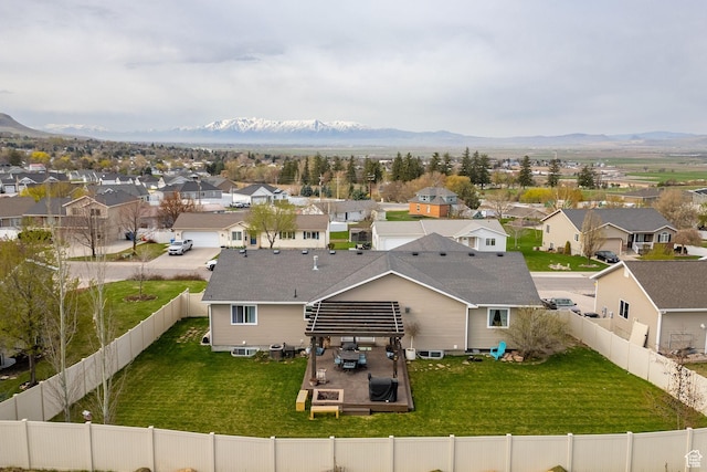 drone / aerial view with a mountain view and a residential view
