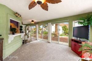 150 S Crystal Lakes Dr Unit 51, St George, UT 84770 - living area with carpet flooring and ceiling fan