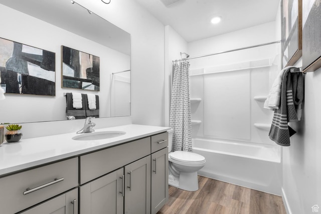 3814 S Landmark Ln Unit 1395, Magna, UT 84044 - bathroom featuring toilet, vanity, wood finished floors, and shower / bath combo with shower curtain