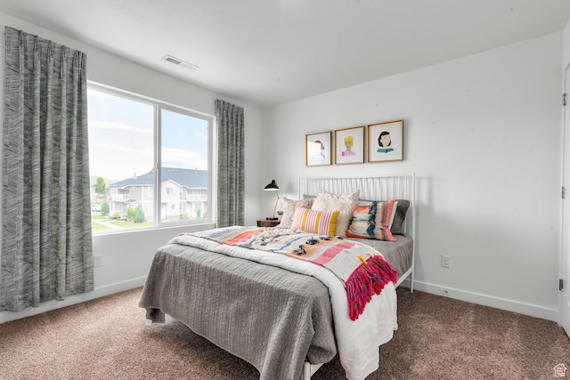 3814 S Landmark Ln Unit 1395, Magna, UT 84044 - carpeted bedroom with visible vents and baseboards