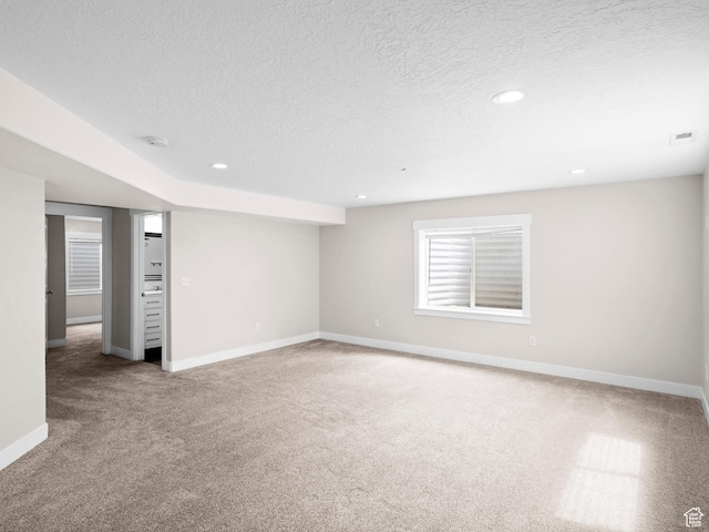 361 W Bridle Cir, Saratoga Springs, UT 84045 - basement featuring a textured ceiling, carpet floors, baseboards, visible vents, and recessed lighting