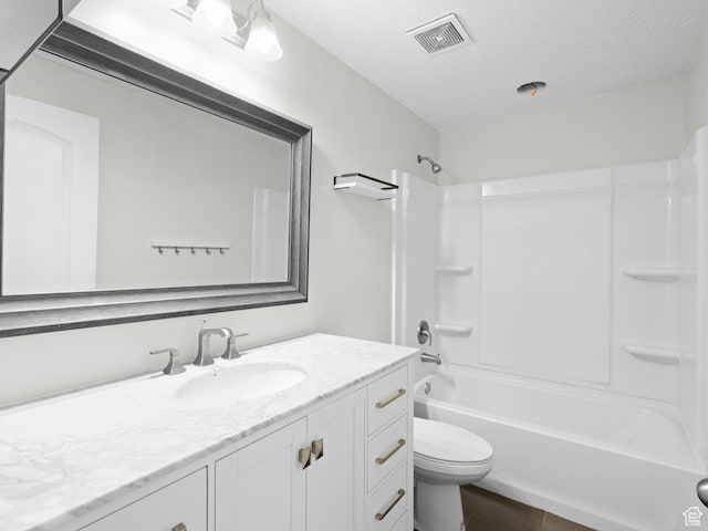 361 W Bridle Cir, Saratoga Springs, UT 84045 - bathroom with a textured ceiling, vanity, washtub / shower combination, toilet, and visible vents