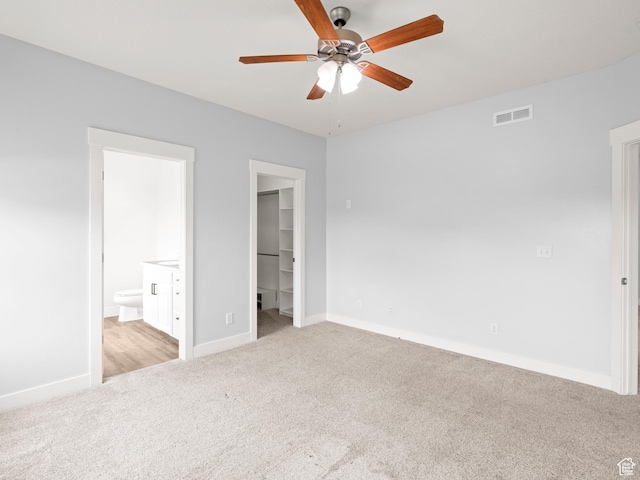 361 W Bridle Cir, Saratoga Springs, UT 84045 - unfurnished bedroom featuring baseboards, a spacious closet, visible vents, carpet, and connected bathroom