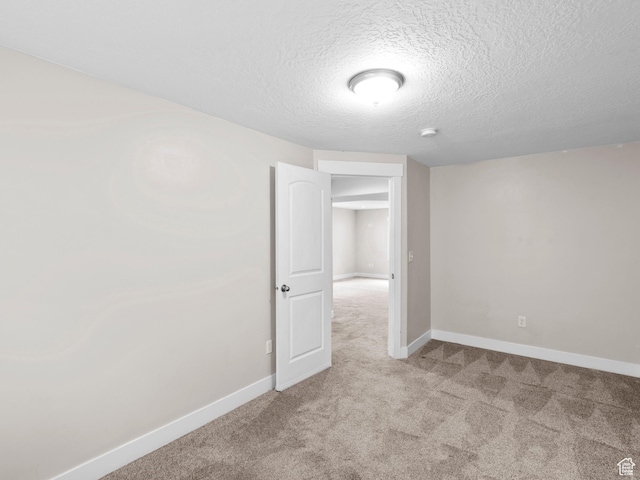 361 W Bridle Cir, Saratoga Springs, UT 84045 - carpeted empty room with baseboards and a textured ceiling