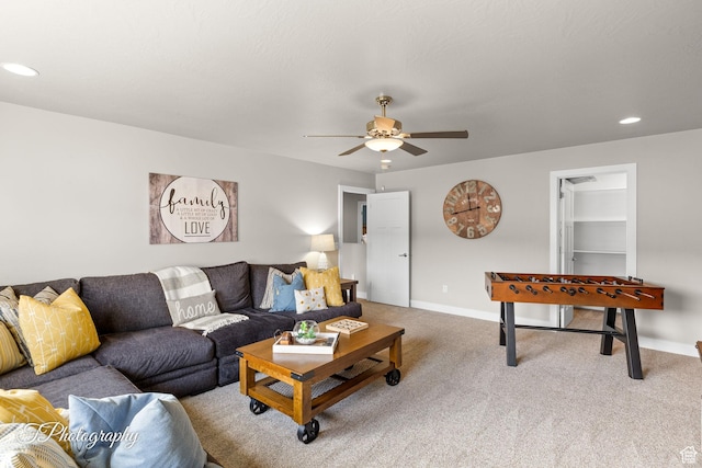 carpeted living room with baseboards, recessed lighting, and ceiling fan