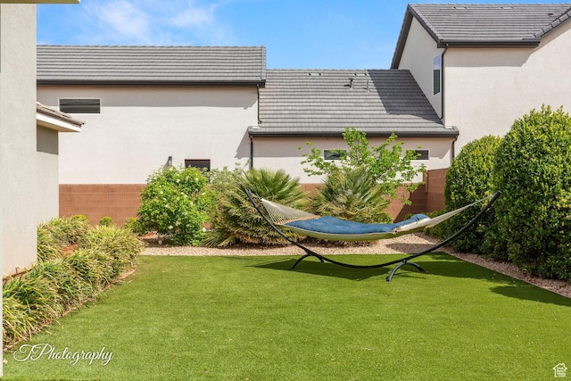 view of yard with fence