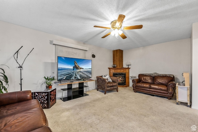 484 W 200 S, Tooele, UT 84074 - living area with a ceiling fan, carpet, a textured ceiling, and a warm lit fireplace