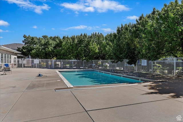 974 W Big River Ct Unit 2, South Salt Lake, UT 84119 - community pool featuring a patio and fence