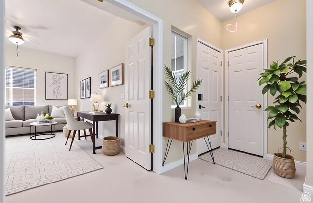 974 W Big River Ct Unit 2, South Salt Lake, UT 84119 - entryway with baseboards and a ceiling fan
