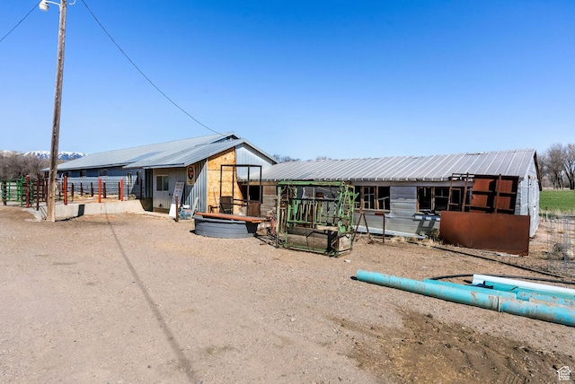 975 N 1400 W, Preston, ID 83263 - rear view of house with an exterior structure and an outdoor structure