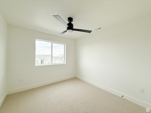 569 W 2030 N, Tooele, UT 84074 - unfurnished room featuring light carpet and a ceiling fan