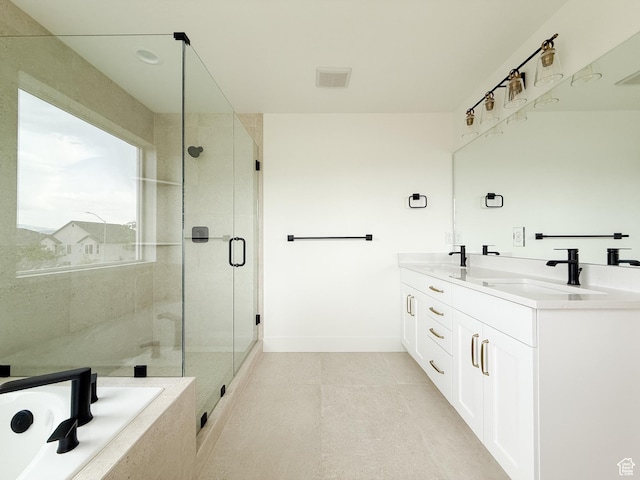 569 W 2030 N, Tooele, UT 84074 - bathroom featuring double vanity, a shower stall, and a garden tub