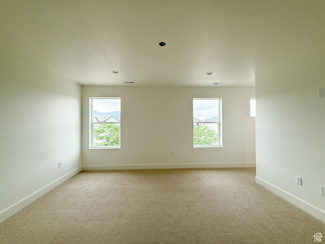 569 W 2030 N, Tooele, UT 84074 - empty room with light carpet and recessed lighting