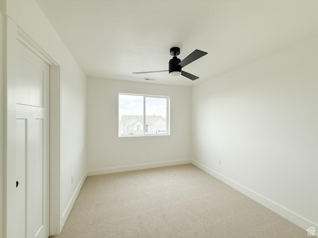 569 W 2030 N, Tooele, UT 84074 - spare room featuring light colored carpet and a ceiling fan