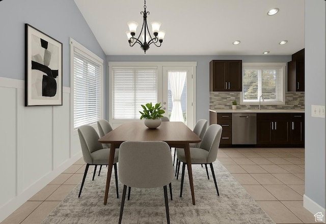 3908 E Smith Ranch Rd N, Eagle Mountain, UT 84005 - dining room featuring recessed lighting, lofted ceiling, a notable chandelier, and light tile patterned floors