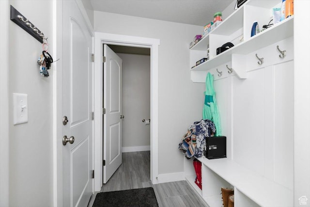 162 E 2480 N, North Logan, UT 84341 - mudroom featuring baseboards and light wood-style flooring