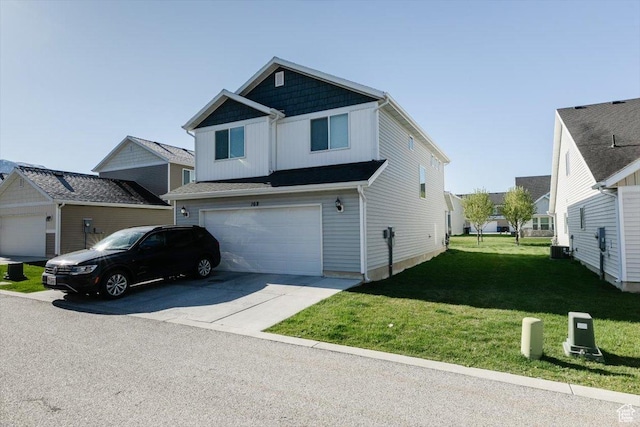 162 E 2480 N, North Logan, UT 84341 - view of front facade featuring concrete driveway, an attached garage, cooling unit, and a front lawn