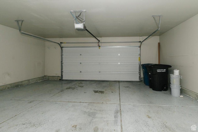 162 E 2480 N, North Logan, UT 84341 - garage featuring a garage door opener