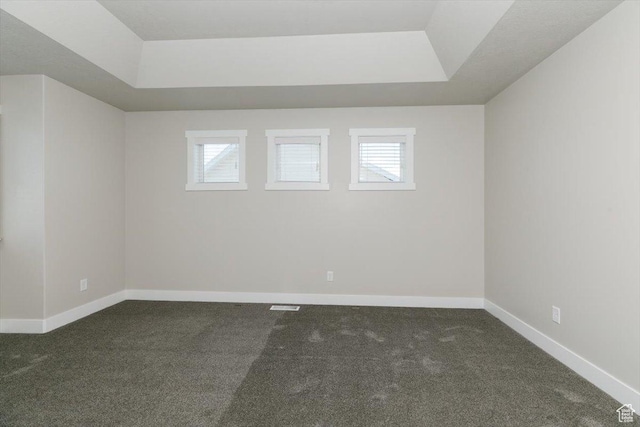 162 E 2480 N, North Logan, UT 84341 - carpeted spare room featuring a raised ceiling and baseboards