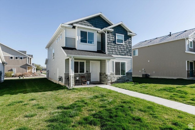 162 E 2480 N, North Logan, UT 84341 - craftsman inspired home featuring stone siding, board and batten siding, a front yard, and central air condition unit