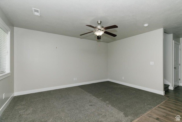 162 E 2480 N, North Logan, UT 84341 - empty room with ceiling fan, baseboards, plenty of natural light, a smoke detector, and a textured ceiling