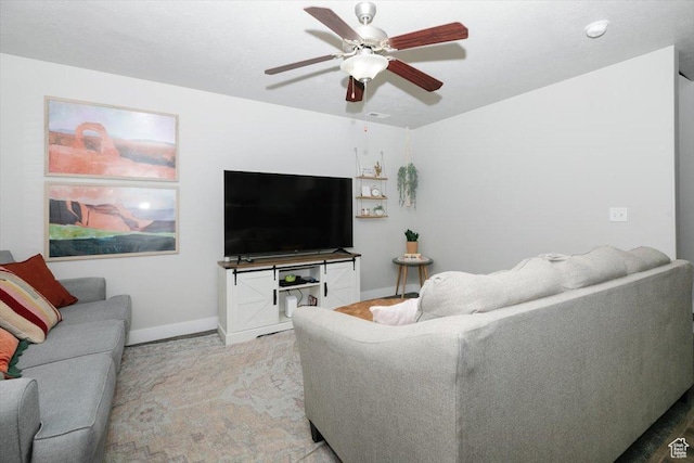 162 E 2480 N, North Logan, UT 84341 - living area featuring light colored carpet, ceiling fan, and baseboards