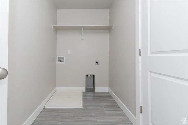 162 E 2480 N, North Logan, UT 84341 - laundry area with hookup for an electric dryer, washer hookup, and baseboards