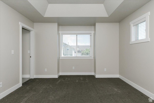 162 E 2480 N, North Logan, UT 84341 - unfurnished bedroom featuring dark carpet, multiple windows, and baseboards