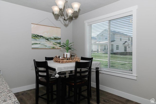 162 E 2480 N, North Logan, UT 84341 - dining space with dark wood-style floors, baseboards, and a chandelier