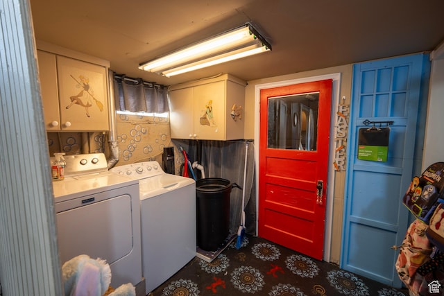 laundry area with cabinet space and washing machine and clothes dryer