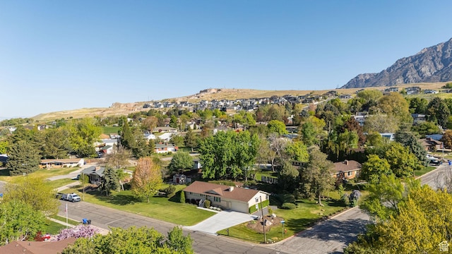 birds eye view of property with a residential view and a mountain view
