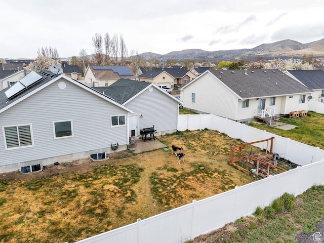 drone / aerial view featuring a mountain view and a residential view