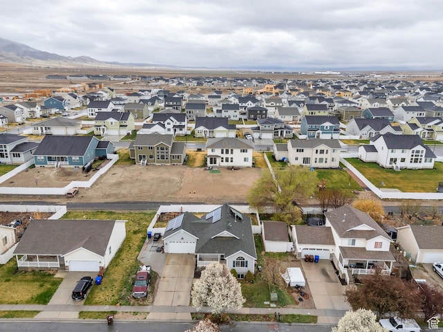 birds eye view of property featuring a residential view and a mountain view
