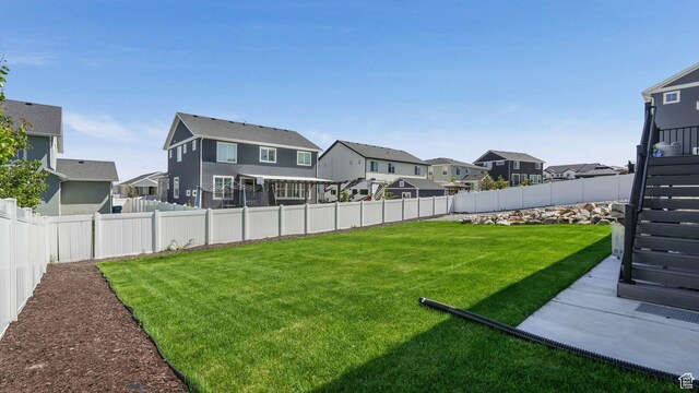 6129 W Coulee Ln, West Jordan, UT 84081 - view of yard featuring a residential view and stairway
