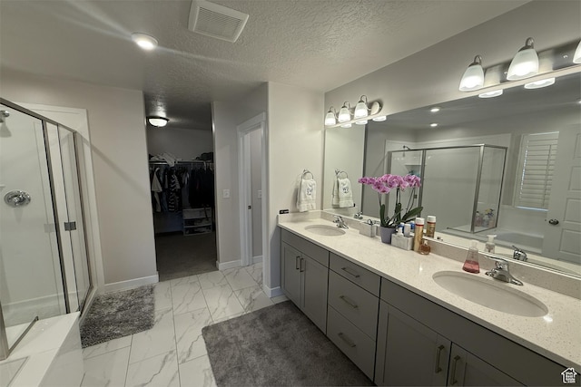 6129 W Coulee Ln, West Jordan, UT 84081 - full bathroom featuring marble finish floor, a sink, visible vents, and a stall shower