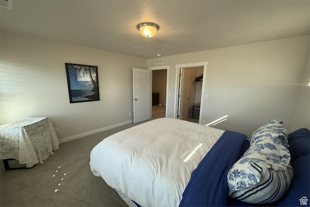6129 W Coulee Ln, West Jordan, UT 84081 - carpeted bedroom featuring a textured ceiling, baseboards, and visible vents