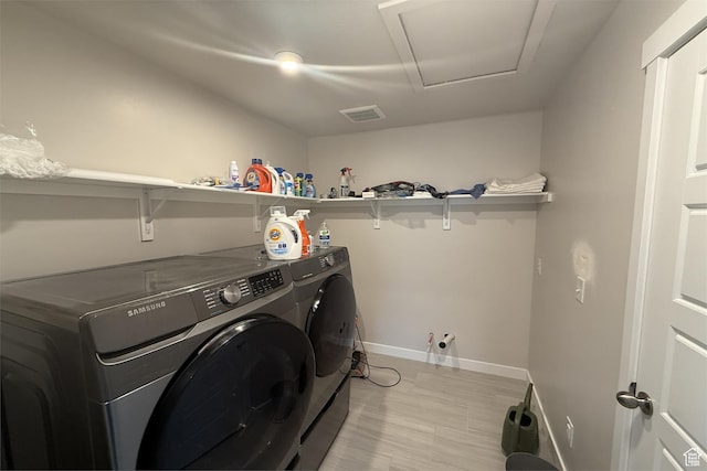 6129 W Coulee Ln, West Jordan, UT 84081 - laundry room with attic access, baseboards, visible vents, washer and dryer, and laundry area