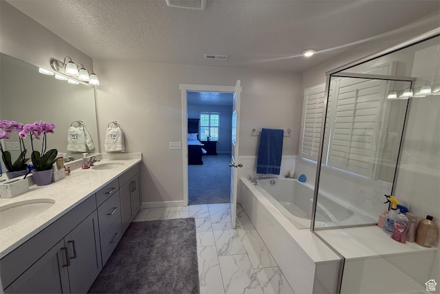 6129 W Coulee Ln, West Jordan, UT 84081 - ensuite bathroom featuring a bath, a sink, double vanity, visible vents, and marble finish floor