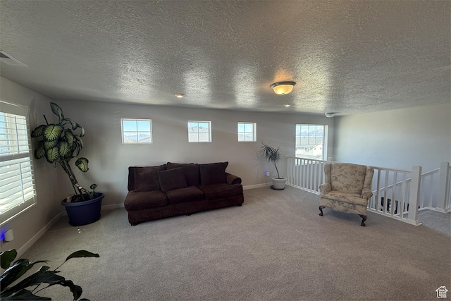 6129 W Coulee Ln, West Jordan, UT 84081 - living room with plenty of natural light, carpet floors, and a textured ceiling
