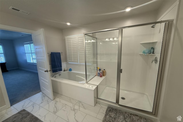 6129 W Coulee Ln, West Jordan, UT 84081 - full bath featuring marble finish floor, visible vents, a garden tub, and a stall shower